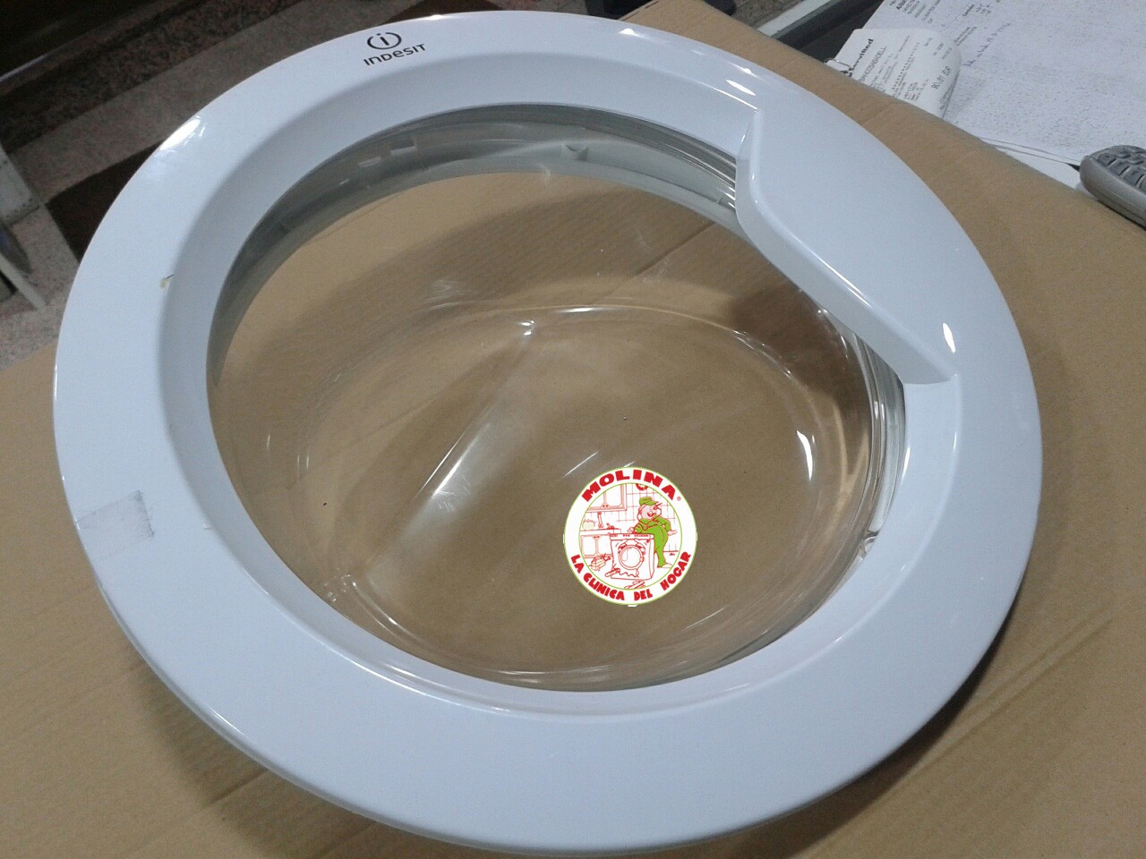 Puerta escotilla lavadora Ariston, Indesit, 42 cm.